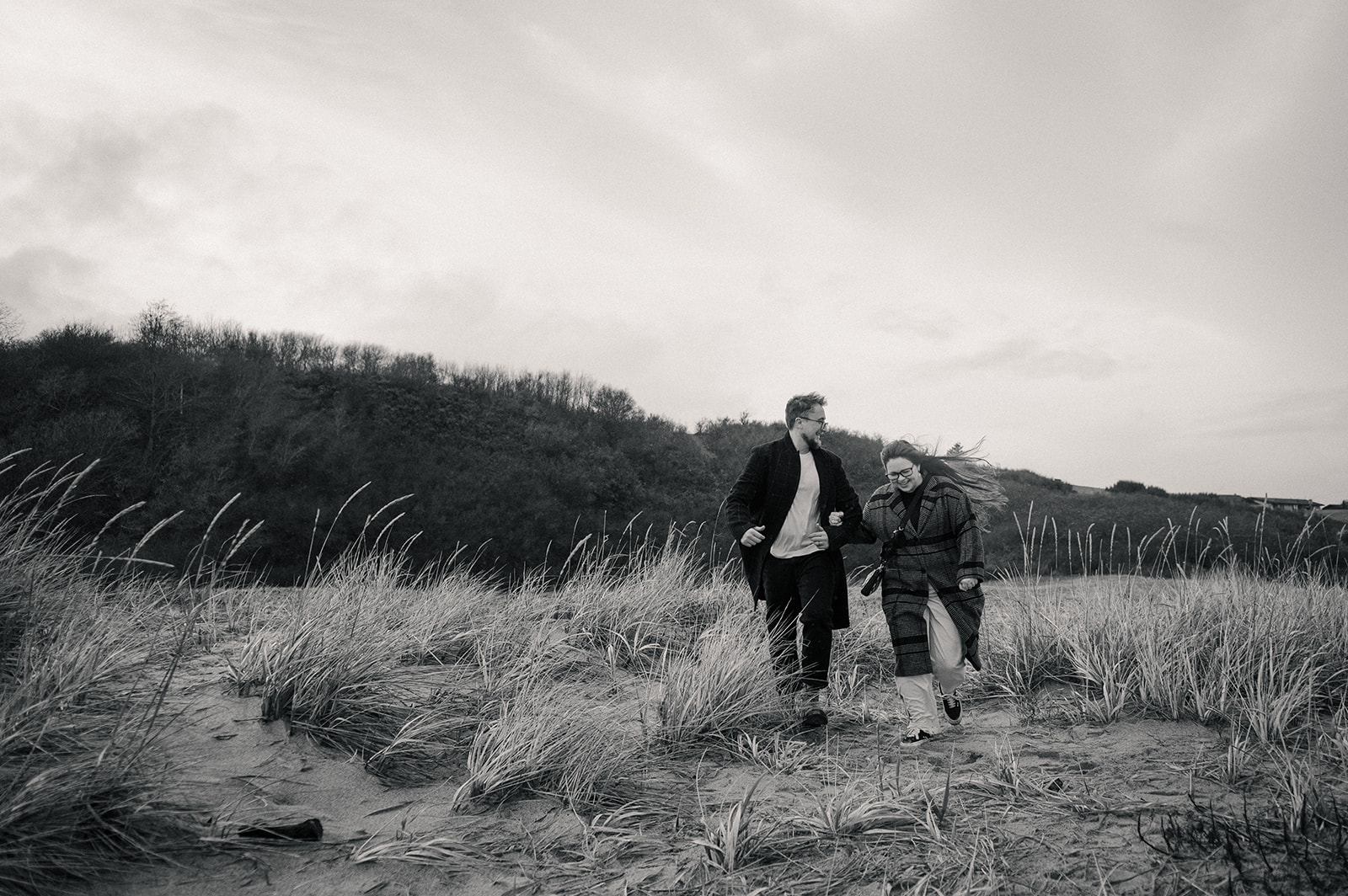 Candid couples session at Air Force Beach by a Comox Valley photographer